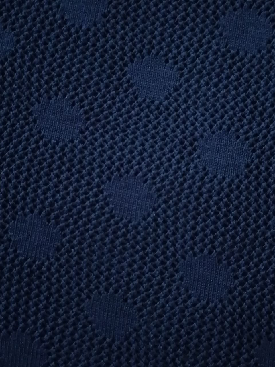Navy blue polka dot shirt
