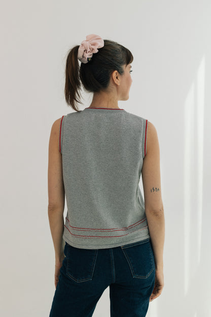 Armilla gris-ribet vermell