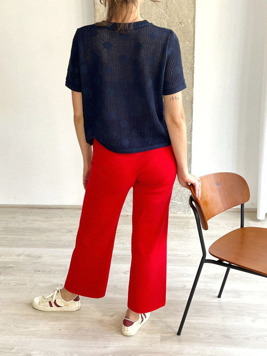 Red knitted trousers