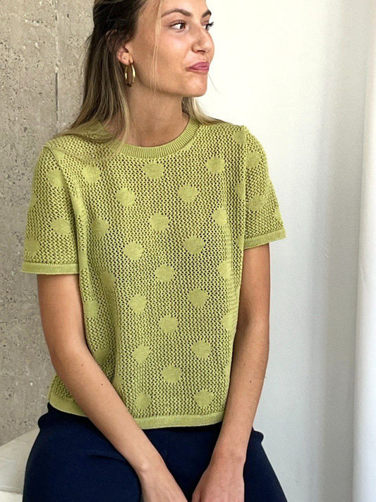 Green polka dot shirt